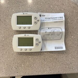 2 Used Trane Programmable Thermostats